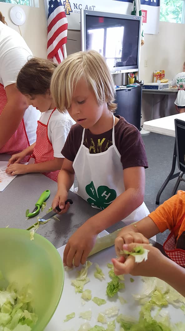 children learning to cook